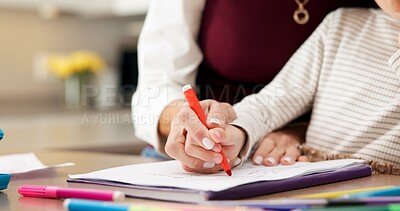 Buy stock photo Homework, mother and child in house with helping hand, childcare and aid with homeschool activity. Education, parent and girl with task support, family guidance and assistance in home learning.