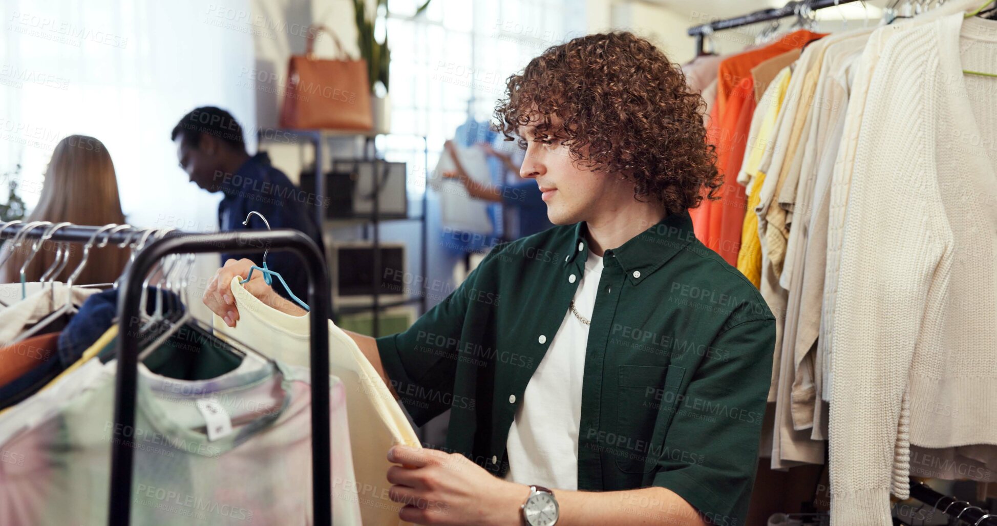 Buy stock photo Shopping, option or man in store with clothing rack, outfit planning or decision in trendy style. Retail, search or customer in boutique with apparel, garment choice or selection in fashion purchase.
