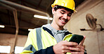 Happy, construction and man with phone in warehouse for message, connection and chat with supplier. Engineering, supervisor and person typing on cellphone, internet and networking for remodeling