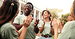 Volunteer, laughing and applause with group, outdoor and happy for fundraising success and charity. People, clapping and celebration for achievement, collaboration and social responsibility for NGO