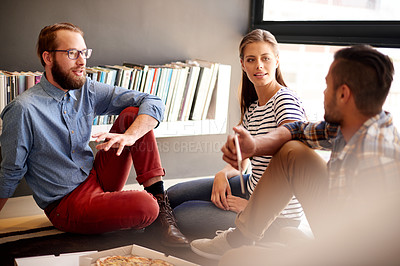 Buy stock photo Startup, creative or designers eating in meeting for pizza meal, project, teamwork in office. Tablet, collaboration or people with takeaway food in business for brainstorming ideas, planning or break