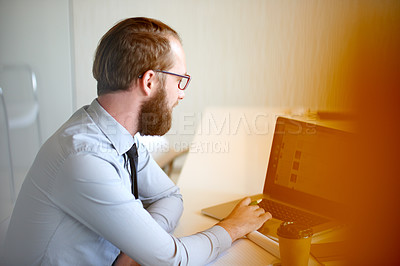 Buy stock photo Business, man and laptop screen with reading in office for sales data, marketing analyst or research. Scroll, creative professional and tech at agency for media analytics and customer experience info