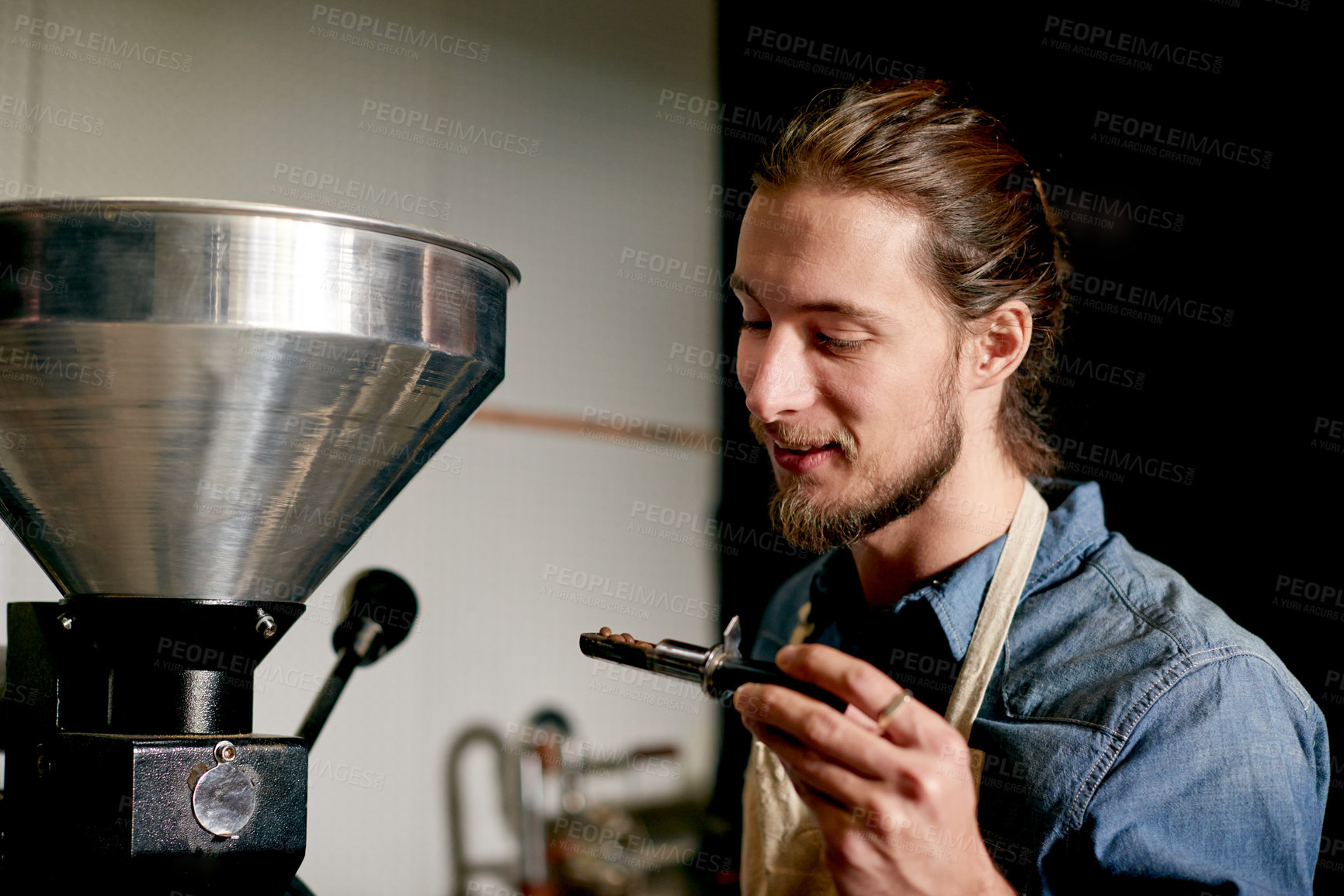 Buy stock photo Machine, roasting and man with beans, inspection and smile for fresh coffee in small business and shop. Quality control, entrepreneur and person with tech for caffeine, cafe or happy with ingredients