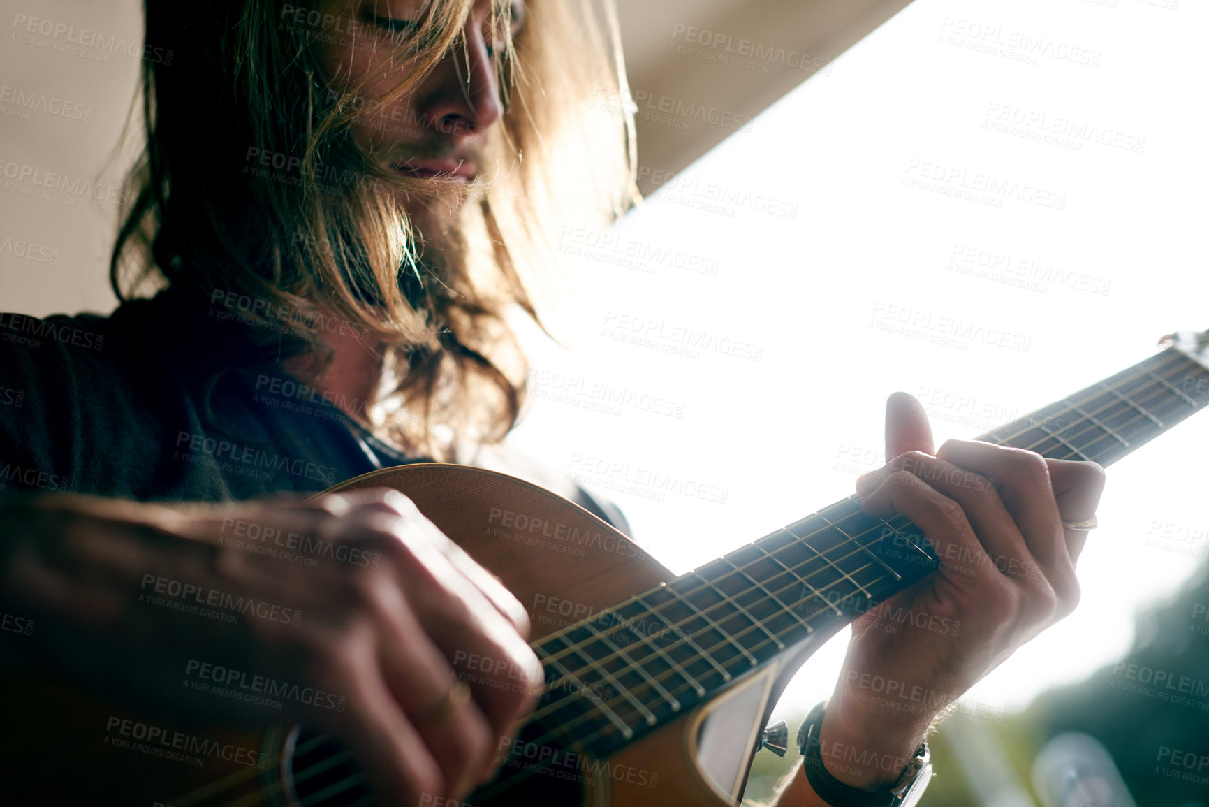 Buy stock photo Composer, music and man with guitar in home with tuning instrument, performance or practice. Artist, rehearsal and male person with acoustic strings for song with talent, hobby or activity in house.