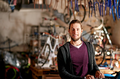 Buy stock photo Bicycle, workshop and portrait of man in store for fixing, repair service and selling bike equipment. Startup, small business and happy person for vehicle maintenance, cyclist technician and mechanic