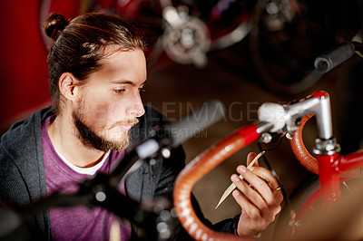 Buy stock photo Checking, price and man in shop, bicycle and reading tag for purchase decision, customer or shopper. Label, inspection and person with brand info for bike, consumer and buyer with choice in store