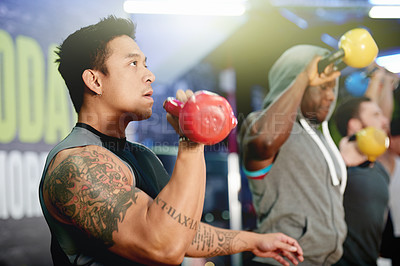 Buy stock photo Fitness class, man and kettlebell exercise at gym for power training, cardio and muscle development. Group, bodybuilder and weightlifting with weights for endurance challenge and functional workout