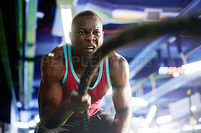 Buy stock photo Black man, training and battle ropes at gym for muscle, development and power with workout for growth. Intense, fitness and person with strong arms, exercise and endurance for progress at health club