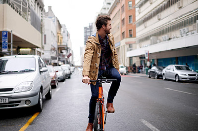 Buy stock photo Man, street and bicycle for eco friendly commute, carbon footprint and sustainable travel in city. Riding, journey and male person on bike, clean transport and cyclist in urban downtown road