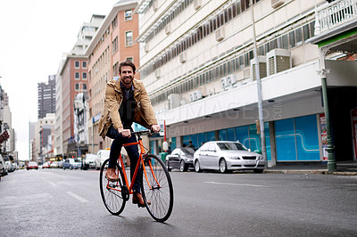 Buy stock photo Biker, portrait and man in city, smile and morning commute with carbon footprint, urban town and wellness. Happy person, bicycle and outdoor with ecology, health and sustainability in Netherlands