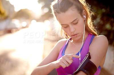 Buy stock photo Girl, earphones and phone for fitness outdoor for getting ready, listening to music and wellness app. Teenager, mobile and streaming podcast for morning routine, start timer and website for exercise
