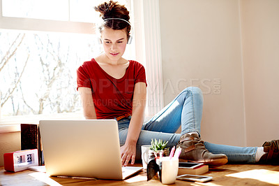 Buy stock photo University, headphones or girl with laptop in home for learning application, podcast or education. Research, music or student on portal to sign up for academic registration or scholarship test marks