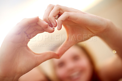 Buy stock photo Women, friends and heart hands at beach for travel, holiday and vacation for bonding together. Girls, love and people with smile, solidarity and ocean trip in Miami for summer adventure and care