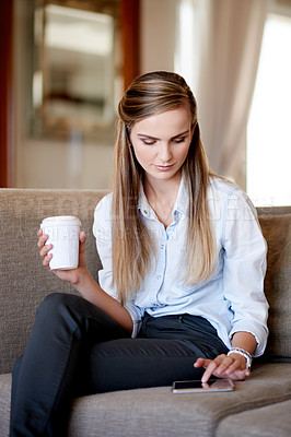 Buy stock photo Woman, thinking and tablet on sofa with typing, social media or planning in home. Girl, student and warm beverage in living room on study break, blog update or idea for creative writing assignment