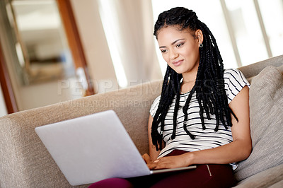 Buy stock photo Smile, student and laptop with woman on sofa for scholarship application, reading and online course. College tuition, financial aid and University credits with person in living room of home
