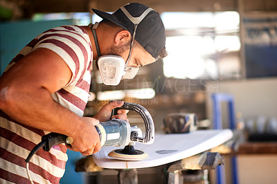 Buy stock photo Machine, man and surfboard in workshop for restoration, project tools or manufacturing. Production, sanding or creative wooden craft in small business for surfing equipment and renovation process