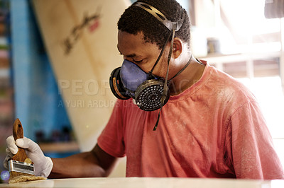 Buy stock photo Man, surfboard and painting in workshop for manufacturing, creative process or gloss coat. Surfing, production and African person with brush for art, design or craftsmanship with tools in factory