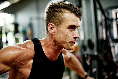 Buy stock photo Serious, man and exercise for bodybuilder, workout and fitness in gym for health and strength. Male person, weightlifting and athlete for muscle development, challenge or training for wellness