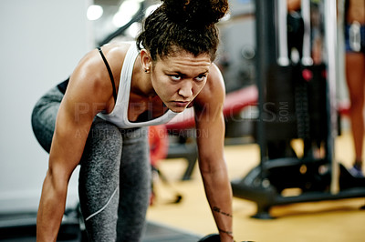 Buy stock photo Fitness, training and woman in gym with concentration, power or wellness in body transformation. Exercise, health or athlete in studio with equipment, workout or resilience for lifting goals.
