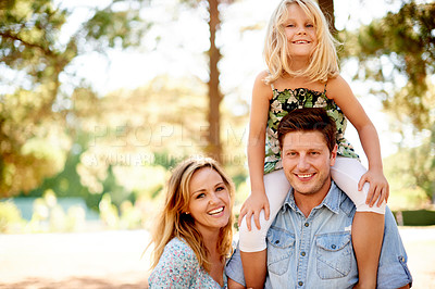 Buy stock photo Parents, portrait and child on shoulder at park for travel adventure, bonding together and holiday. Support, happy family and carry in nature for weekend break, vacation and relationship connection