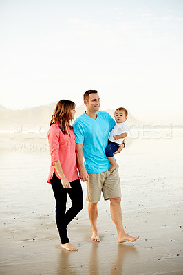 Buy stock photo Baby, parents and holding hands at beach for bonding space, together and travel in nature. People, mom and dad with boy kid, walking on shore or adventure by ocean with family vacation in Argentina