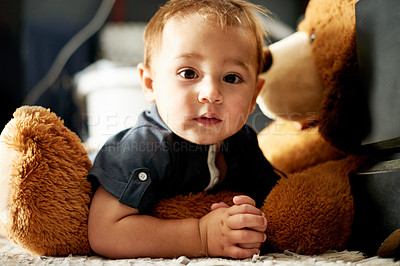 Buy stock photo Home, portrait and child with teddy bear, cozy and comfortable with fluffy toy, resting and toddler. Break, boy and adorable with plush, stuffed animal or relax on floor, growth or development in USA