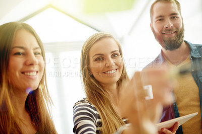 Buy stock photo Teamwork, writing and business people by glass in meeting for brainstorming, online project and planning. Creative office, startup and happy workers on tech for research, agenda and collaboration