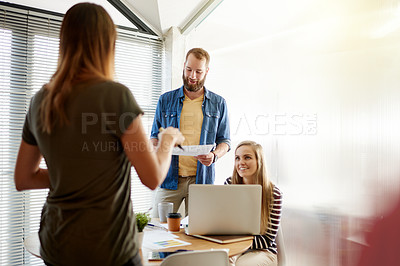 Buy stock photo Conversation, documents and laptop with creative people in office together for brainstorming meeting. Collaboration, computer and paperwork with business team in workplace for design strategy