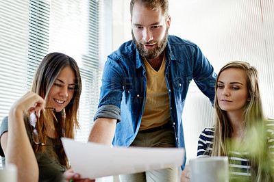 Buy stock photo Meeting, documents and team with business people in office for media briefing, report and collaboration. Press release pitch, journalist update and partnership with employees in creative agency