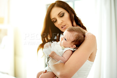 Buy stock photo Mom, hug and comfort with baby for love, support or gentle parenting of motherhood in home. Mother, kid or holding infant with embrace for childhood development, youth or bonding together in house