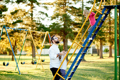 Buy stock photo Father, girl and park with slide, children and play outdoor in summer with care, love and fun. Dad, kids and helping hand on steps in nature, climbing or bonding with family for games in Argentina