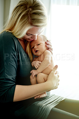 Buy stock photo Home, woman and bonding with child, embrace and parent with love for newborn, protection and safety. Family, together and mom with baby in nursery, affection and childcare for infant or comfort