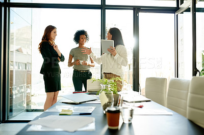 Buy stock photo Business women, tablet and group discussion in meeting for review, update or news report. Technology, happy team and planning with manager in office for feedback, creative journalism and delegation