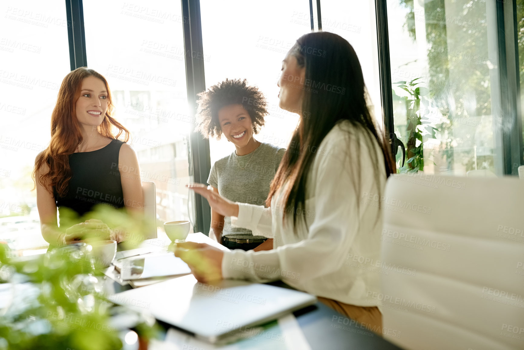 Buy stock photo Women, meeting and smile in discussion for conversation, workshop and news in office for business. Partnership, employee and teamwork for planning, idea and strategy with documents for communication