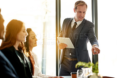 Buy stock photo Boardroom, communication and man with tablet, meeting or new ideas for funding opportunity or pitch. Office, people and account manager with tech for investment strategy, talking and business growth