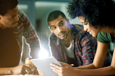 Buy stock photo Night, group and coworkers with tablet, creative and planning for deadline, men and woman in office. Working late, colleagues and journalist with tech for story, flare or fact checking of article
