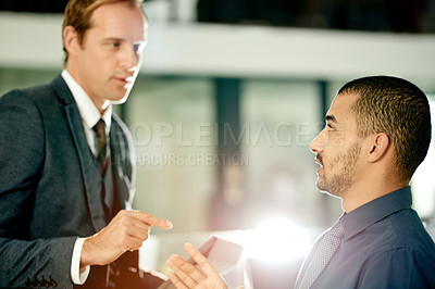 Buy stock photo Discussion, talking and business men in office lobby for planning company budget report together. Meeting, conversation and financial advisor with manager for feedback, investment proposal and flare