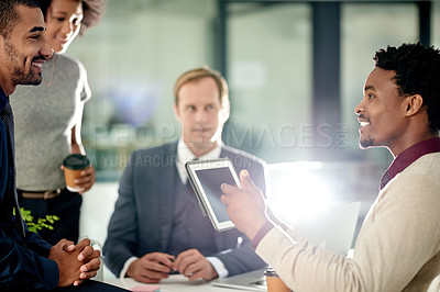 Buy stock photo Man, lawyer and group with tablet at meeting, talk and happy for review, proposal and legal services. People, team and smile in office with tech, app or feedback for report at corporate law firm