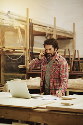 Buy stock photo Carpenter, writing and man with phone call by laptop for client update, production chat or feedback. Carpentry, worker and speaking to supplier for material order, project discussion and negotiation