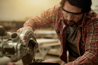 Buy stock photo Carpenter, saw and man in workshop for renovation, manufacturing and timber production. Artisan, craftsmanship and carpentry tool with machine for small business, lumber and restoration in studio