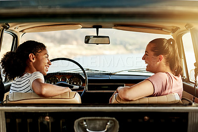 Buy stock photo Laughing, women and friends in car, adventure and excited for road trip, getaway or summer vacation. Tourism, driver and people in vehicle for holiday, bonding and happy for journey with transport