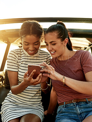 Buy stock photo Road trip, happy and friends in car with phone for social media on holiday, vacation and adventure. Travel, online message and women with smartphone for bonding on journey, destination and getaway