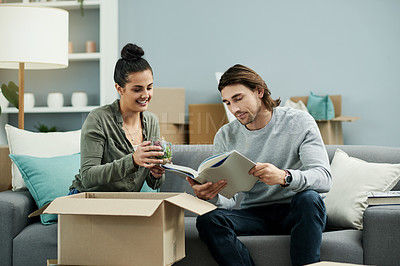 Buy stock photo New home, packing and couple with boxes on sofa for moving to house, property mortgage and purchase. Homeowners, happy and man with woman with package for relocation, rental apartment and real estate