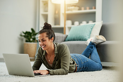 Buy stock photo Woman, relax and floor with laptop at house for research, browsing social media and reading ebook. Female person, smile and digital for surfing internet, streaming film and entertainment subscription