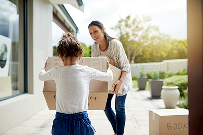 Buy stock photo Mother, child and helping with boxes in new home for property investment, relocation and fresh start. Real estate, happy woman and girl kid with teamwork for moving in, mortgage purchase and support
