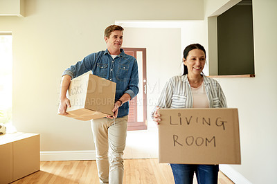 Buy stock photo Box, moving in and unpacking with couple in new home together for property investment or relocation. Carry, real estate or walking with man and woman homeowner in living room of modern apartment