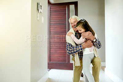 Buy stock photo Hug, grandfather and child in home for greeting, love and family reunion with girl for support. Excited grandpa, kid and embrace together for welcome, connection and laugh for care with generations
