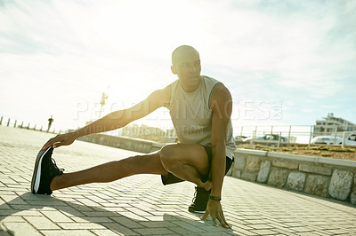Buy stock photo Fitness, stretching and man at promenade with thinking, flexibility or workout to relieve stiffness. Hamstring, exercise and athlete outdoor with sneakers, cardio and posture to ease muscle tightness