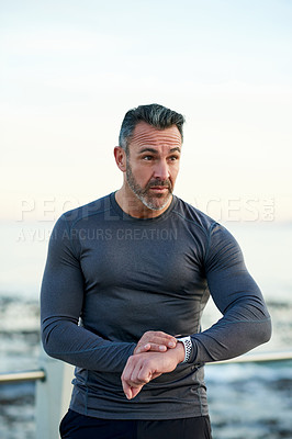 Buy stock photo Outdoor, smart watch and man with exercise, progress and challenge with tracker, training and time. Person, runner and athlete with digital app, fitness and wellness with monitor and body health