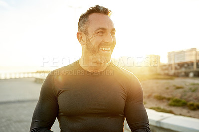 Buy stock photo Promenade, fitness and man in city in morning for exercise, marathon training or cardio workout. Sports, sunshine and person for wellness, rest and happy for performance, endurance and running